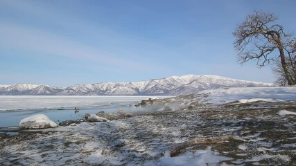 Wall Mural - frozen lake shore winter landscape and blue sky, lake kussharo, hokkaido, japan