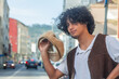 © tetxu - young hispanic latino man with cap on the street