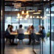 © Bambalino Studio - A group of people are sitting around a table in a conference room. Scene is professional and collaborative. Business background