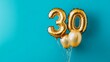 © ryanbagoez - Banner with number 30 golden balloon with copy space. thirty years anniversary celebration concept on a blue background