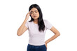 © Sewupari Studio - Beautiful young Asian woman suffering from headache with a frustrated expression isolated on white background