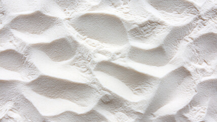 Poster - White sand texture with wavy patterns viewed from above, creating serene and natural landscape. soft, undulating surface evokes sense of calm and tranquility