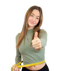 Young beautiful girl smiling okay gesture with tape meter in dieting concept over transparent background. PNG transparent.