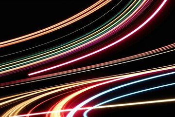 Wall Mural - vibrant light trails in high-speed motion on dark background