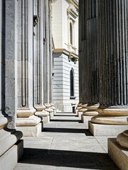 Wall Mural - View of classical architectural columns with intricate details and shadows