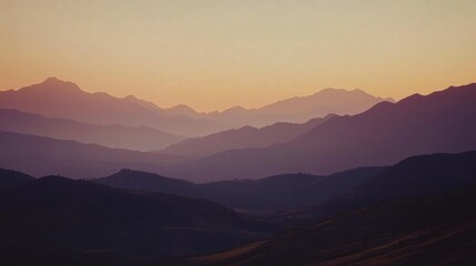 Aufkleber - Sunset casts beautiful hues over a mountain range, revealing layered peaks and valleys as the day transitions to night. Generative AI
