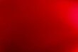 © Wiratri - red background with a pattern. Colorful red gradient blurry abstract background.