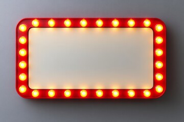 vintage marquee sign with glowing yellow light bulbs and red border on gray background