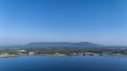 Wall Mural - Phu Langka mountain look through Bueng Khong Long the largest frehwater reservoir in Bueng Kan province of Thailand.