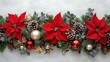 © sarun - Seasonal decor featuring red poinsettias, pinecones, and ornaments surrounding blank white space.