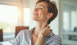 © Radorog. - beautiful woman massages her neck with pleasure in the office