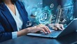 © MRSUTIN - A person hand is typing on a laptop overlaying a holographic image showing various legal icons