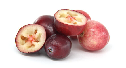 Wall Mural - Fresh Cranberries With Halved Fruit On White Background