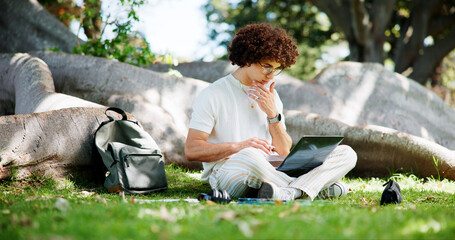 Poster - Man, student and laptop for studying at park, lawn and reading with project for online course. Person, computer and e learning on grass for scholarship, exam and education with thinking in Costa Rica