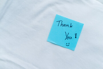 Fototapete - Gratitude in business thank you note on white fabric close-up inspirational calm environment personal touch