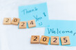 © M21Perfect - New year transition thanking 2024 and welcoming 2025 business reflection home office warm ambiance close-up optimism