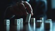 © Zahfran - Businessman hand stops a falling domino, symbolizing control and strategy