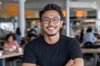 © Papukos - Smiling asian man with folded arms in food court: