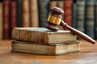 © Ruzimah - Classic Law Books and Gavel on Wooden Table