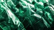 © Eric - Cluster of green plastic bottles stacked together, textured and reflective surfaces, recycling concept, monochromatic color scheme, environmental awareness