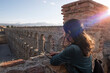 © FotoAndalucia - Segovia Aqueduct.  Woman looking this roman architecture