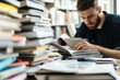 © YouraPechkin - Young man studies among stacks of books in a library during the afternoon