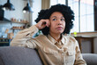 © InsideCreativeHouse - Close up side profile view of pensive young african American woman thinking of relationships problems, thoughtful black biracial female feel despair lost in thoughts consider life trouble or drama