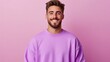 © Trushchenko_O - Man is smiling and wearing a purple shirt. The shirt is tight and the man's hair is short