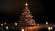 © Erika - un fondo oscuro con un arbol de navidad hecho de troncos y palos de madera decorado para celebraciones de navidad con espacio de copia
