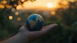 © Khalid - A miniature Earth resting on a hand, with soft bokeh lights from a serene countryside in the background, emphasizing sustainability and human impact