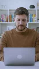 Busy Professional Business Man Typing on Laptop, Young Male Worker Software Developer, Latin Businessman Looking At Computer Thinking On Online Investment Management Using Computer Working At Office.