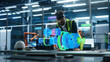 © Gorodenkoff - Male Engineer Uses an Augmented Reality Headset to Interact With 3D Holographic Model of Engine in a High Tech Factory, Showcasing Innovative Manufacturing Processes and Advanced Digital Visualization