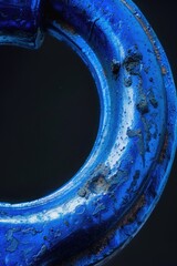 Wall Mural - A close-up shot of a blue metal object with intricate details