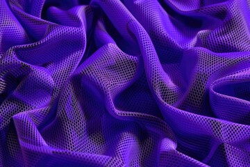 A detailed shot of a beautiful purple fabric texture