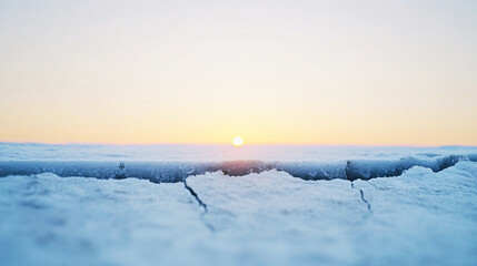 Wall Mural - cracks spreading across thick ice at sunset over frozen lake or river