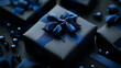 © Olga - Luxurious black gift box with glossy blue ribbon for elegant celebrations and special occasions