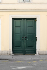 Wall Mural - View of building with green door