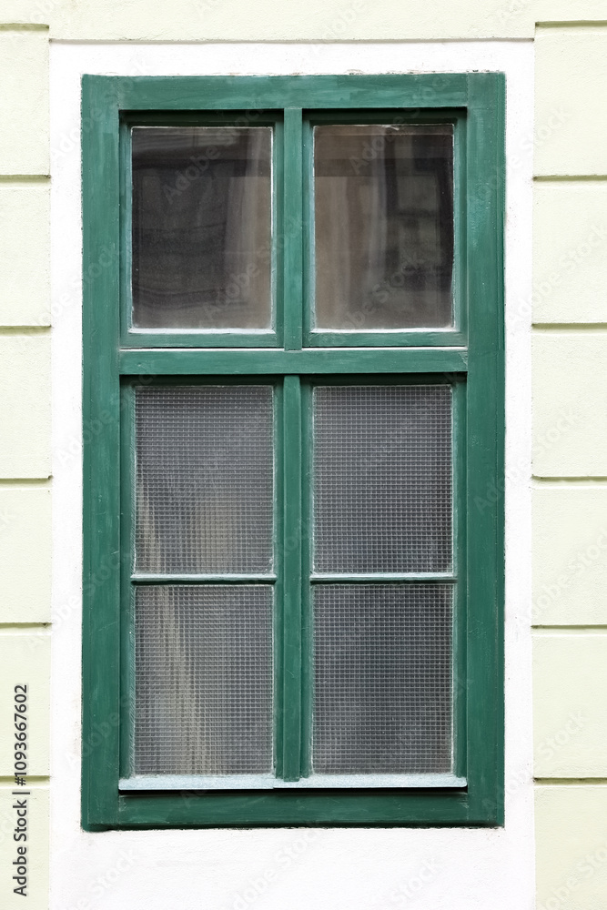 View of building with green window
