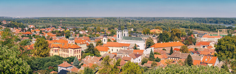 Wall Mural - A panoramic aerial view of Sremski Karlovci highlights the stunning summer landscape, with its unique heritage and vibrant urban center nestled in Vojvodina, Serbia