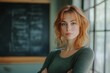 © ArtCraft - Confident young woman with red hair standing in front of chalkboard in classroom setting, emphasizing education and aspirations