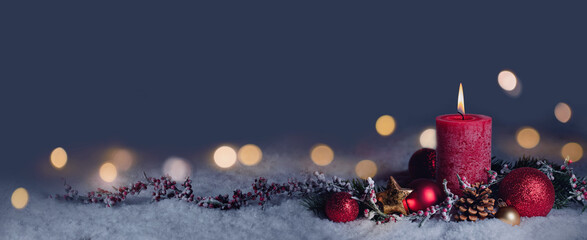 Wall Mural - red christmas candle - first advent sunday - 1. advent or xmas decoration with snow background and m