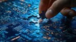 © arif - Hand placing the final piece of the puzzle on a shiny blue digital background with circuit boards and technology elements. Futuristic business concept for marketing or social media design