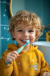 © Lerson - cheerful toddler brushes teeth with glowing toothbrush, showcasing bright smile. colorful bathroom setting adds to joyful atmosphere