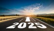 © Joseph Christianto - a highway road, with 2025 and arrow sign on the road. wallpaper template for motivational quotes new year.