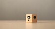 © tiger - Curiosity and Communication Concepts with Wooden Cube Questions and Answers on Gray Background