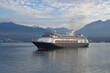 © Tamme - Classic luxury cruiseship cruise ship liner Volendam or Zaandam arrival into Vancouver, BC Canada after Alaska cruise with scenic harbor coast view and marine vessels