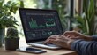 © Chayanan - Hands typing on laptop displaying data charts for analysis and business insights - Concept of person analyzing data on screen