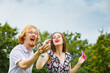 © Voyagerix - Couple blowing soap bubbles, having fun