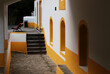 © Julie - Typical yellow building and red bench in Azores, Portugal