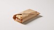 © Pixel Matrix - Neatly-folded sandwich wrapped in paper displayed on a clean white backdrop showcasing fast food  eco-consciousness